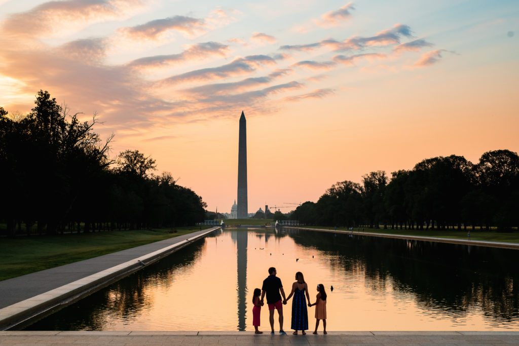 A family in front of the Washington Monument
